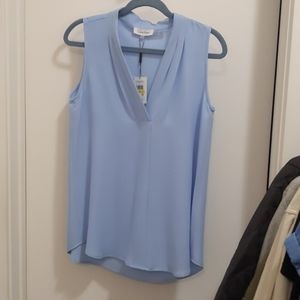 Women's light blue sleeveless blouse